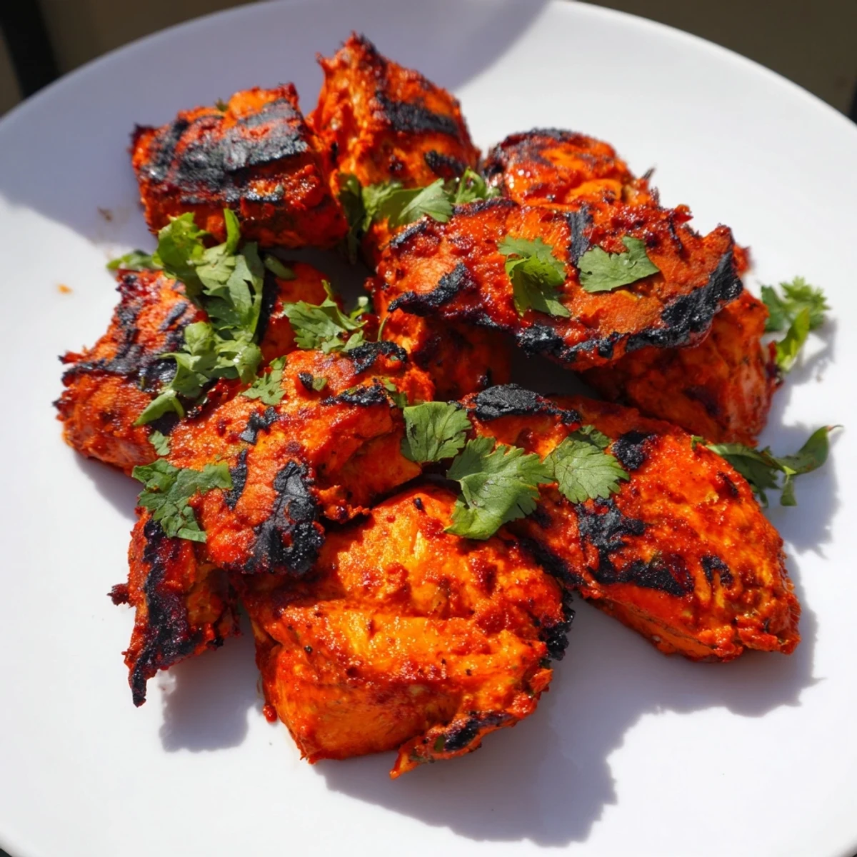 Tender, charred chicken pieces marinated in yogurt and spices, perfect for a flavorful weeknight dinner.