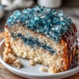 Graduation cake with teal and gold geode slice design, perfect for celebrating with elegance and creativity.