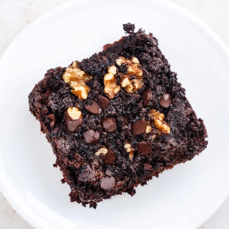 Rich and fudgy black bean brownies, baked to perfection and ready to enjoy with a glass of milk.