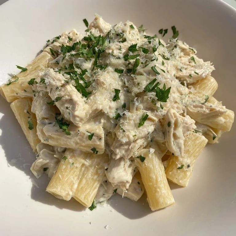 This Slow Cooker Chicken Alfredo Pasta Bake offers a comforting taste of Italian-American cuisine, perfect for a cozy dinner.